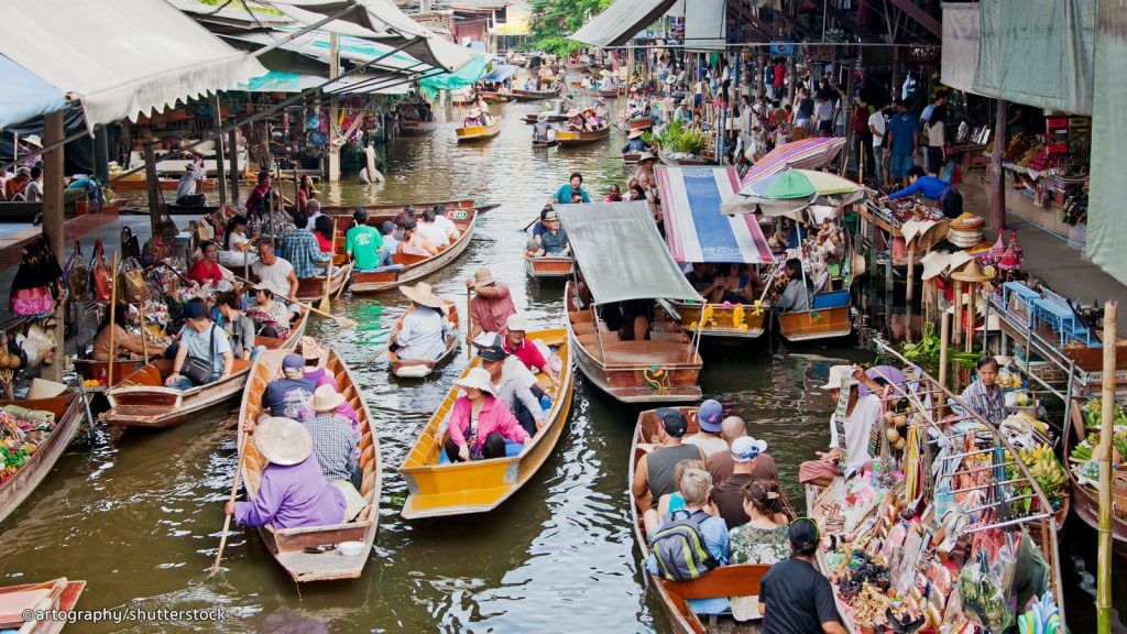 Pattaya Floating Market with vendors on traditional boats